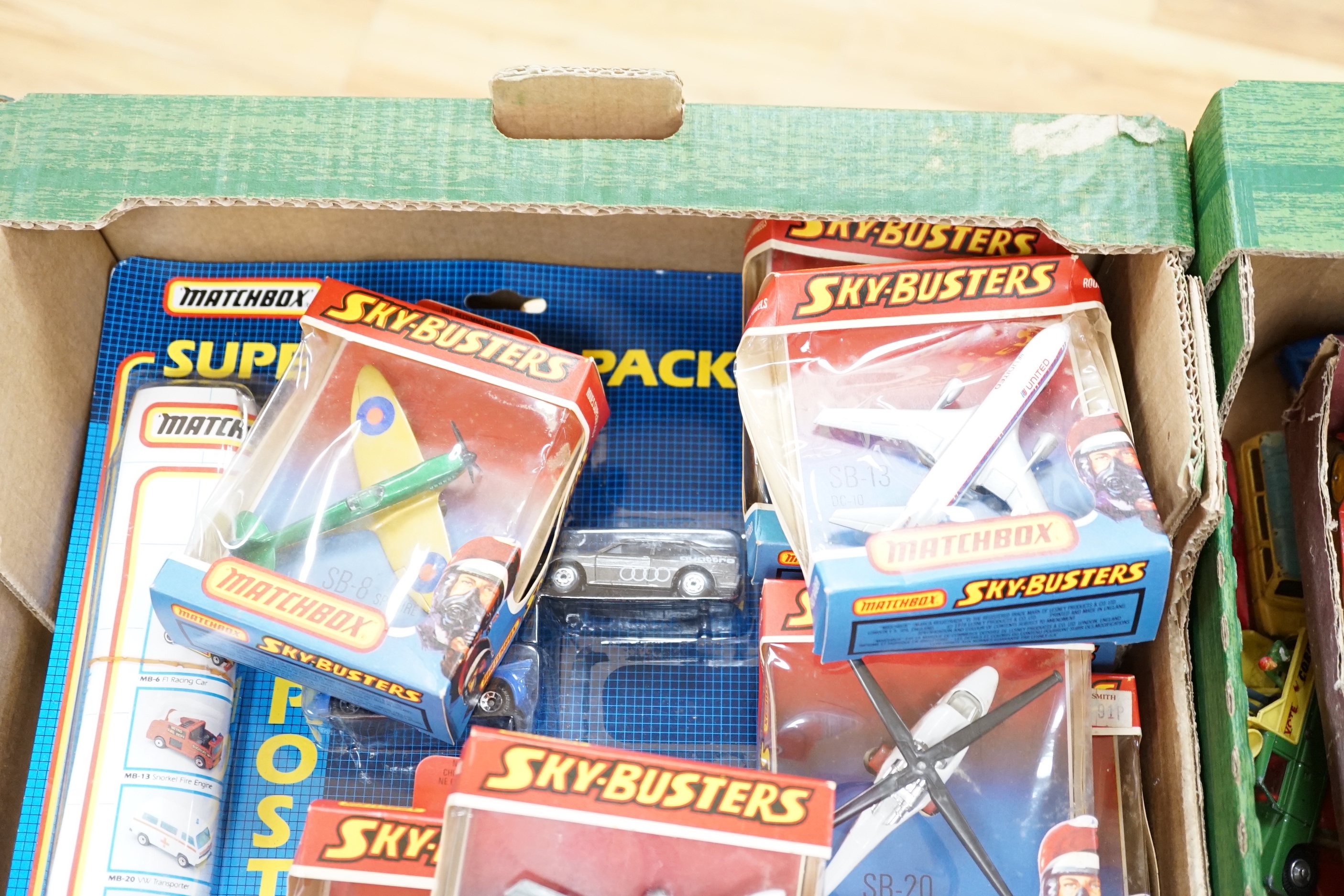 Thirty one boxed 1970s Matchbox Sky Busters diecast aircraft, together with two 1980s Matchbox ‘Super Value Packs’ of diecast vehicles